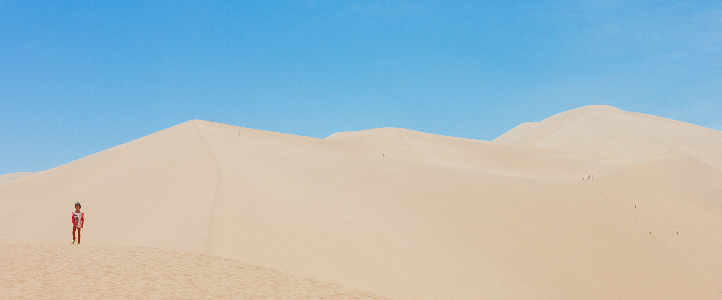 A Little Boy with Giant Sand Dunes